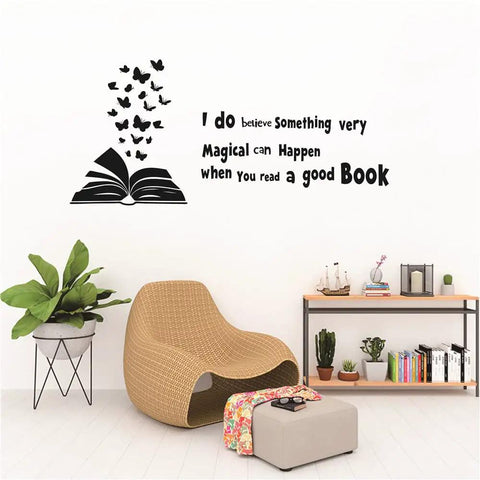 Reading Book Wall Decal Open Book With Butterflies And Inspiring Quote For Kids Study Room Bedroom Decor Black Vinyl Peel And Stick 60x28 Inches Perfect For Kids Room Nursery displayed on a wall with a chair and bookshelf