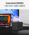 Next Level 2 Bay DAS Storage Enclosure With Hella Fast 10 Gigabit USB 3.2 Gen2 Port for RAID Zero Array Supporting Two SATA Drives Diskless Desktop Drive Cage for Smooth Daily Backups and Heavy File Transfers connected to a laptop displaying speed metrics.