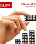 Hand holding Double Row 12 Circuit Screw Terminal Block Junction Strip with Barrier 300V 20A Heavy Duty Tin Plated Brass Terminals