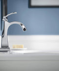Ridgeport Single-Handle Lavatory Faucet for Modern Bathrooms with chrome finish on white sink, sleek contemporary design.