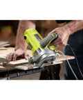 Beast 12 Amp Corded Wet Tile Saw with 4 inch blade in use for cutting tile, showing precise pro-grade cuts with wet cooling system.