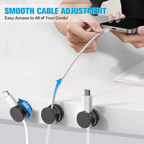 Person managing cables with Six Piece Cord Organizer Set With 360 Degree Rotating Cable Clips And Strong Adhesive on a desk edge.