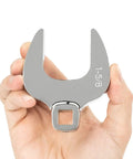 Person holding one half inch drive to one and three eighths inch crowfoot wrench ultra compact access tool, steel engraved size marking