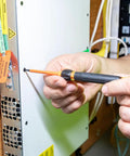 Using 8-In-1 Insulated Screwdriver Set With Case 1000V Rated on electrical panel, showcasing Phillips 00 and 0 precision.