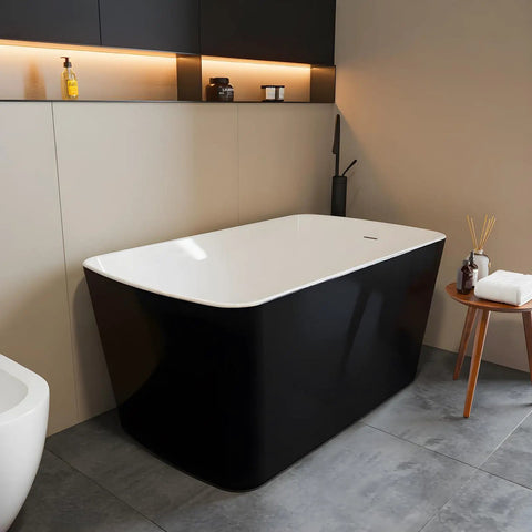 Premium Freestanding Acrylic Oval Soaking Bathtub 67 Inch Deep Soak Basin With Sleek Chrome Drain in modern bathroom setting.