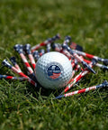 250 Years Commemorative All American Patriot Golf Ball with Eagle and Flag Design on grass with red and blue tees