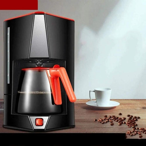 Top Shelf Automatic Espresso Maker crushing your morning grind with sleek design and orange accents on countertop.