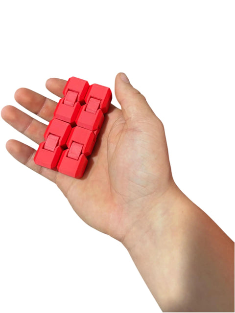 Hand holding a red 3D Printed Infinity Cube Stress Relief Toy For Focus And Fun A Pocket Sized Fidget with smooth folding action
