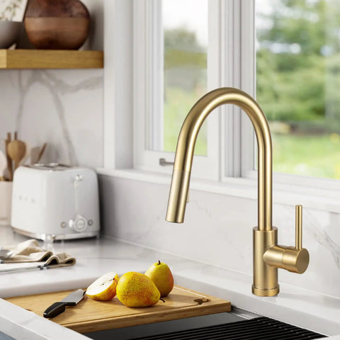 Brushed Gold Kitchen Faucet With Pull Down Sprayer Solid Brass Construction Single Hole Mount With Deck Plate One Handle No Fuss Setup Reach Technology And Flexible Swivel Hose For Easy Sink Access in modern kitchen setting
