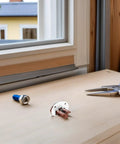 Plastic And Metal Drawer Slide Repair Kit With Noise Reduction Technology shown on a table with installation tools