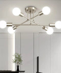 Dope Modern Sputnik Chandelier Ceiling Light Fixture With Six Lights installed in a modern dining room, nickel finish, adjustable arms