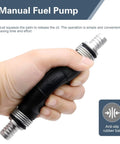 Hella Durable Handheld Fuel Transfer Pump With Leak Proof Check Valve, Heavy Duty Rubber Primer Bulb Adapter being held for manual operation.