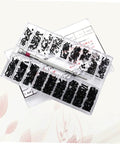 Heavy Duty Small Screw Assortment Kit Featuring 18 Miniature Flat Head Machine Screws Forged From Solid Carbon Steel Inside A Compact Carrying Case Ideal For Notebook Or Glasses Fixes Smooth Sailing With Zero Sweat with black screws organized in a transparent case.