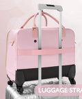 Pink TSA friendly rolling laptop bag for women with four spinner wheels and telescopic handle attached to a suitcase.