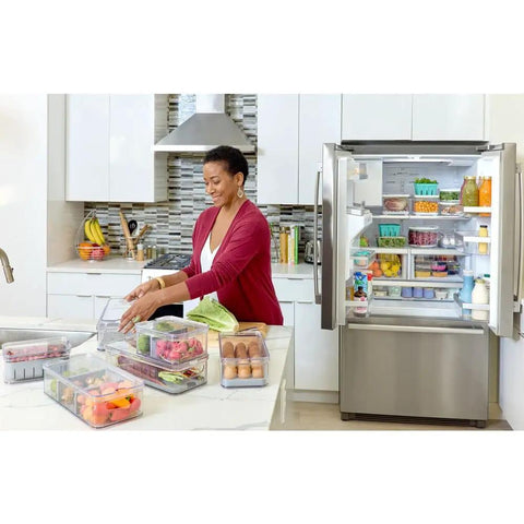 Woman using Removable Drainage Tray Storage Bin For Refrigerator And Pantry, Stacking Bin With Lid And Inner Basket, BPA Free.