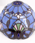 Close-up of blue purple stained glass shade for Tiffany Style Table Lamp With Blue Purple Stained Glass, Baroque Inspired Reading Desk Light, Metal Leaf Base, 21 Inch Tall, Ideal For Small Spaces, Bedside Bedroom Or Home Office Decor, UL Listed.