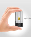 Rugged Aluminum Alloy DC 24 Volt Industrial Air Fan Heater For Cabinet With Quick Kickin Heat, mini size demonstrated by hand.