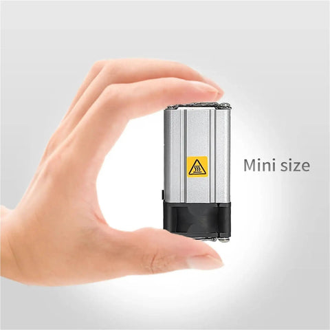 Rugged Aluminum Alloy DC 24 Volt Industrial Air Fan Heater For Cabinet With Quick Kickin Heat, mini size demonstrated by hand.