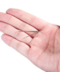 Hand holding Titanium Piercing Kit 14G 16G 18G 20G ASTM F136 Hypoallergenic Threadless Push In Taper Insertion Pins