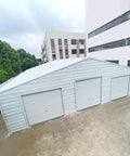 Heavy Duty Steel Barn Garage With Roll Top Metal Doors For Trucks Tractors Rvs Atvs And Workhorses Storage Shelter outdoor view.