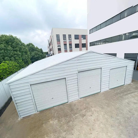 Heavy Duty Steel Barn Garage With Roll Top Metal Doors For Trucks Tractors Rvs Atvs And Workhorses Storage Shelter outdoor view.