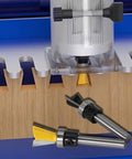 Top Tier Four Piece Dovetail Router Bit Set Featuring Precision Bearing Guides For Cabinetry And Fine Woodworking in use on wood.