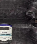 Dark Charcoal Reactive Wood Stain For Interior Cabinetry Hardwood Floors And Reclaimed Timber canister on dark wood background.