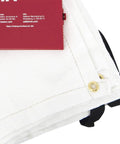 Edges of emergency fire blanket with brass grommets beside red steel cabinet. Emergency Fire Blanket With Red Steel Cabinet 6 By 5 Feet Fiberglass Material High Temperature Resistant And Chemical Resistant Lightweight Durable Quick Access Wall Mount Safety Kit For Home Workshop Or Commercial Use visible partially.