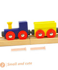 Miniature Wooden Nails Set For DIY Crafts And Woodworking, 20 Pieces Of Solid Wood T Nails For Train Wheel Projects shown next to toy train