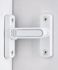 White Barn Door Latches With Adjustable 0 To 7 Millimeters Height For Flawless Gap Alignment and 90 Degree Swivel Lock on a white door.