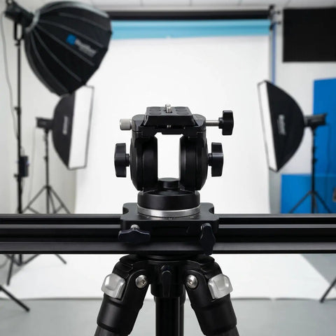 Top Shelf 1/4-20 X 1 1/4 Inch Thumb Screws With Black Knurled Aluminum Knobs For Camera Rig And Workshop Mounting Tool Free Quick Release Hardware No Sweat Setup Guaranteed Solid Grip on tripod in photography studio.