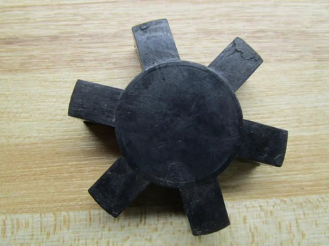 Rubber JS5N Straight Jaw Coupling Insert 2.687 Inch OD Closed Center Spider Durable Precision Machinery Part on wood surface