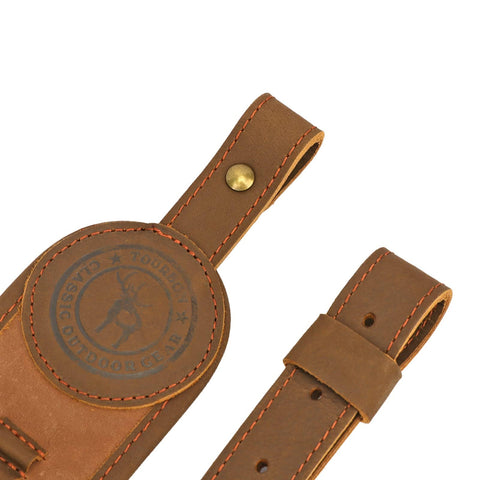 Close-up of brown Canvas Leather Rifle Sling With 14 Shell Slots For 22 Caliber Ammunition Storage, showcasing buckle and stitching.