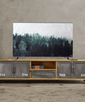 Killer Industrial Solid Wood TV Console With Hella Roomy Storage Drawers Closed Cabinets And Vintage Iron Details For Ultimate Living Room Vibes And Game Night Comfort, featuring four drawers and a flat-screen TV.