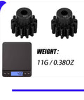 Beefed-Up 2 Pack 13-Tooth Hardened Steel Pinion Gear 32 Pitch 3mm Shaft shown on a scale weighing 11g