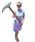 Person holding Inflatable Pick Axe Prop 33 Inch Wood And Silver Mining Tool for Party Decor And Themed Events