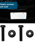 Tough As Nails M6 Plastic License Plate Screw Kit With Secure Fit Hex Nuts For Cars Trucks Motorcycles Sturdy Plastic Build Heavy Duty Bolt Set In Black And White 30 Piece Pack close-up of black plastic screws and nuts for license plates.
