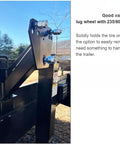 Stake Pocket Spare Tire Carrier for Trailers, heavy duty mount bracket in black steel, installed on trailer.
