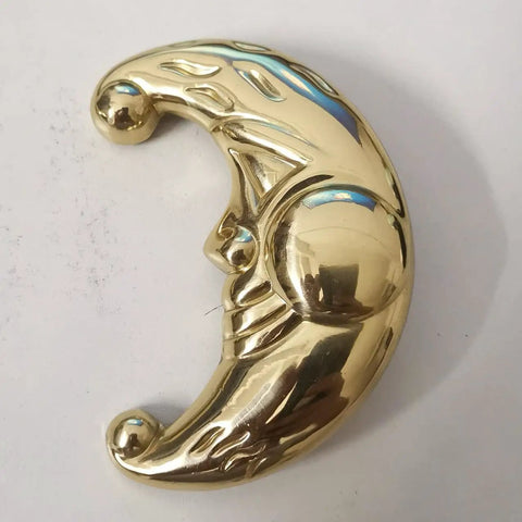 Solid brass crescent moon knob from Sun Moon Cabinet Knobs Set, antique finish, celestial drawer pulls for kitchen, bath, dresser, wardrobe.