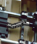 Close-up of metal drive shaft upgrade kit for 1/16 scale WPL RC trucks showing smooth power transfer mechanism