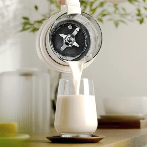 Pouring smoothie from blender with Beefed Up Blade Cutting Assembly Replacement For Gallon Blenders Part 502977 Fits CB6 CB10 CB15 Series