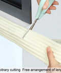 Foam Edge Protectors And Corner Guards Bumpers For Furniture Grey 4 Pack With Pre Applied Adhesive being cut to size with scissors