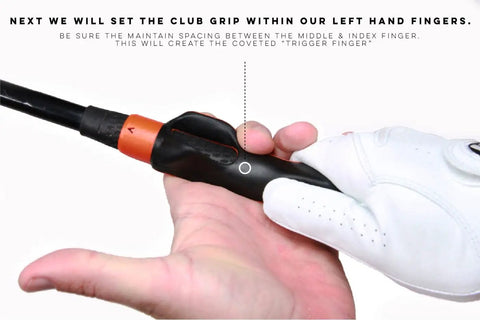 Left-Handed Golf Grip Trainer Attachment For Dialing In Your Grip And Consistent Swings On The Club, Black, shown in use on club.