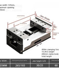 Heavy Duty Five Inch Self Centering Vise With Rock Solid Parallel Jaws showing dimensions and features for CNC machining and pipe clamping.