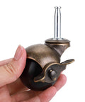 2 Inch Ball Caster With Grip Neck Stem And Brake Sockets For Furniture Set Of Four Vintage Swivel Caster Wheels For Ottoman And Coffee Table Heavy Duty Plastic And Steel Construction Each Caster Supports Up To 88 Lbs Stem Mount Five Sixteenths Inch By held in hand