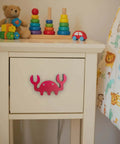 8 Pack Ocean Sea Animal Wooden Cabinet Knobs Set With Tiny Turtle Decor For Nursery and Kids Rooms displayed on a drawer