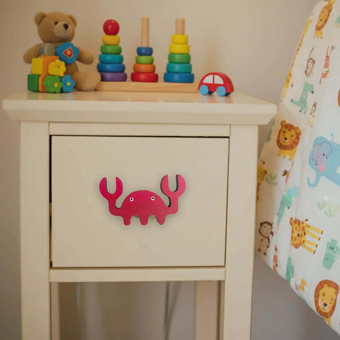 8 Pack Ocean Sea Animal Wooden Cabinet Knobs Set With Tiny Turtle Decor For Nursery and Kids Rooms displayed on a drawer