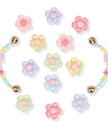 Pastel Jelly Daisy Flower Shoe Charms Set With Glossy Bling Floral Buckles in assorted colors and shapes on a white background.