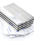 16-pack neodymium bar magnets with double-sided adhesive, 60 x 10 x 3 mm, silver.
