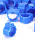 Close-up of blue 10mm plastic pigeon leg clip rings showing 200 Pcs 10mm Pigeon Leg Clip Rings for Poultry Foot Identification Easy Install No Fuss